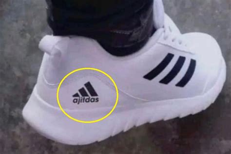 fake adidas adiboss|are adidas shoes false.